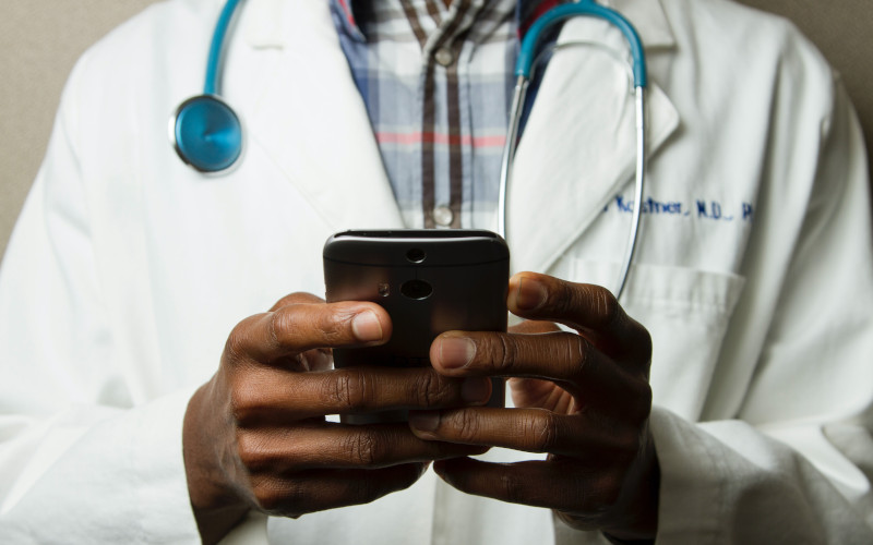 Man holding stethoscope